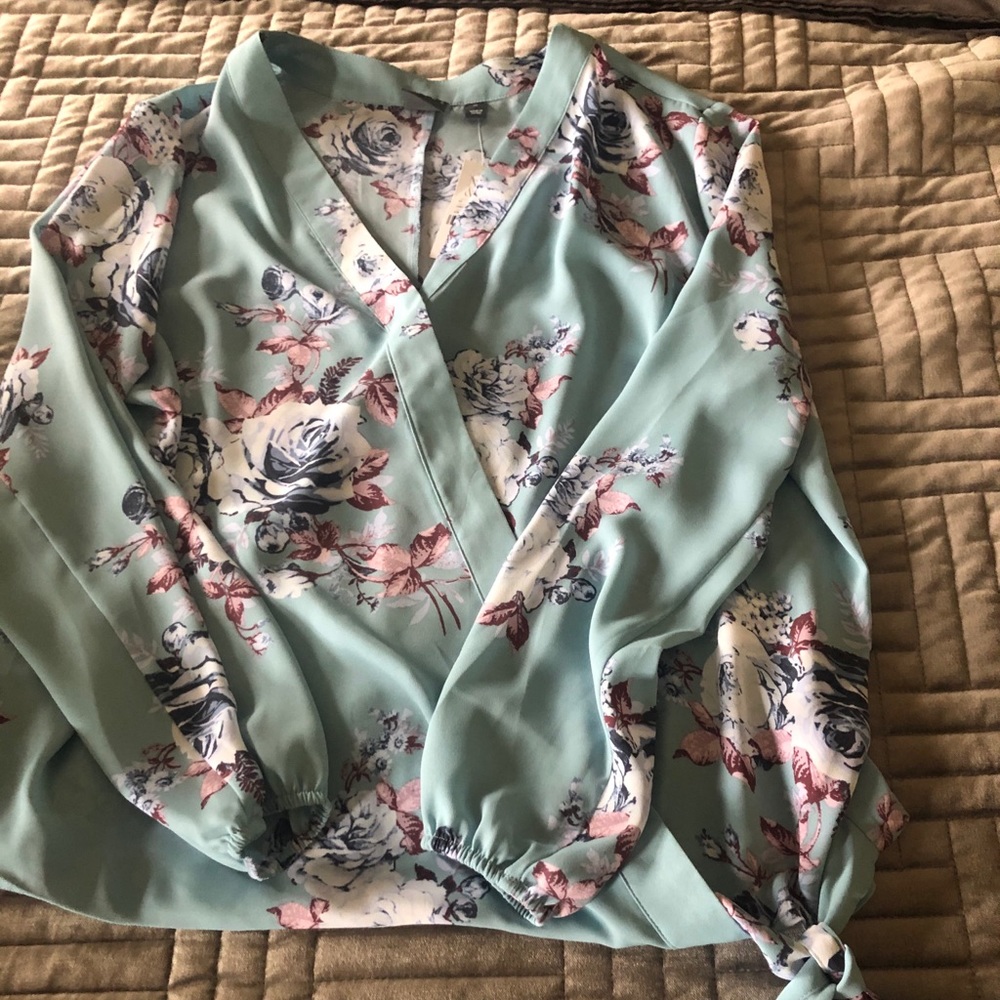 Brand new floral blouse.